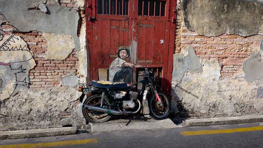 Boy on motorbike georgetown