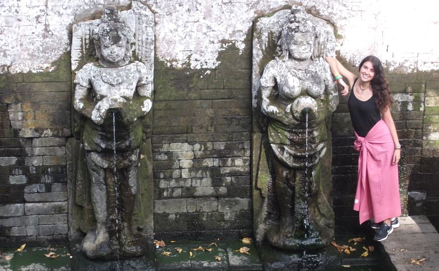 Female stone statues that supply purified pools of Goa Gajah. Southeast asia route