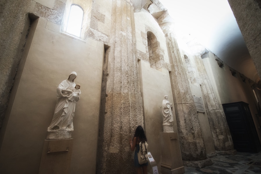 one day in syracuse Greek columns of the Temple of Athena in the Cathedral of Syracuse hotels Sicily Italy