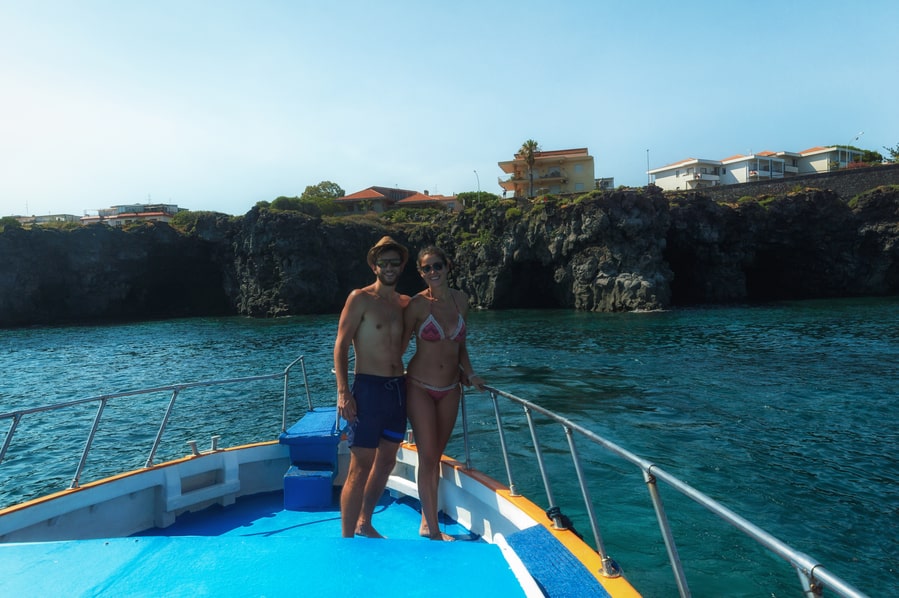 Excursion by boat through the Faraglioni of Aci Trezza Sicily Italy