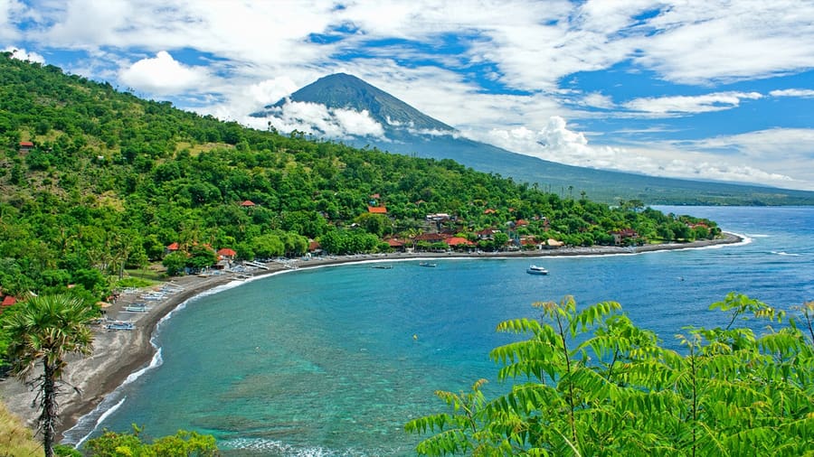 amed beach a place you need to visit in bali amed beach with mount agung at the background