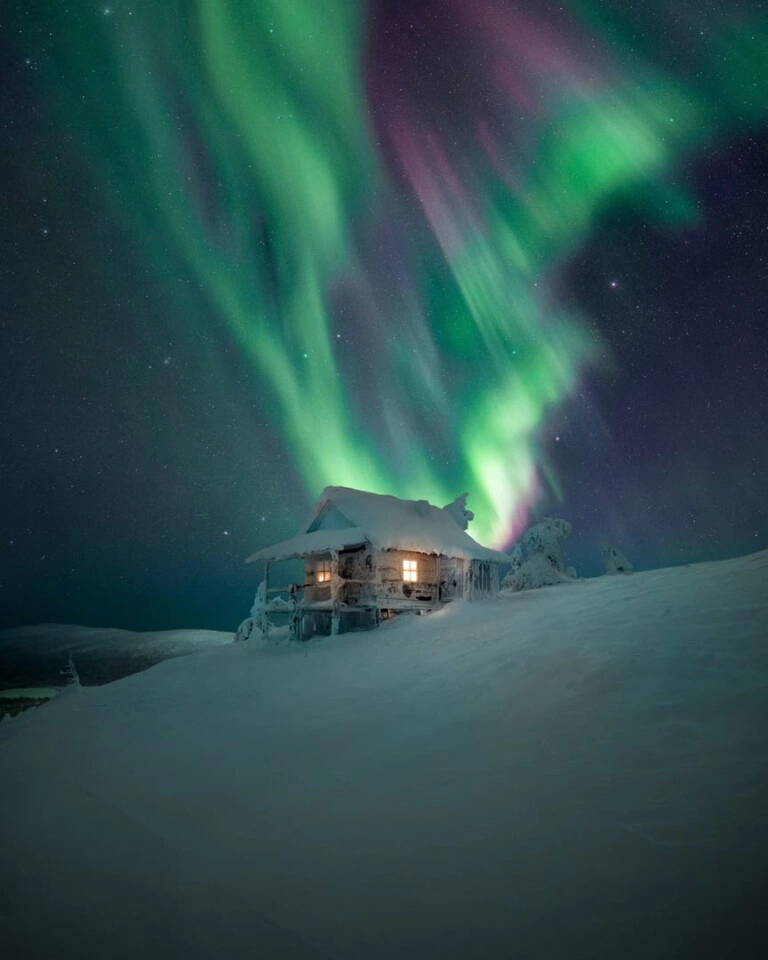 Northern-Lights-and-cabin-winter-768x960
