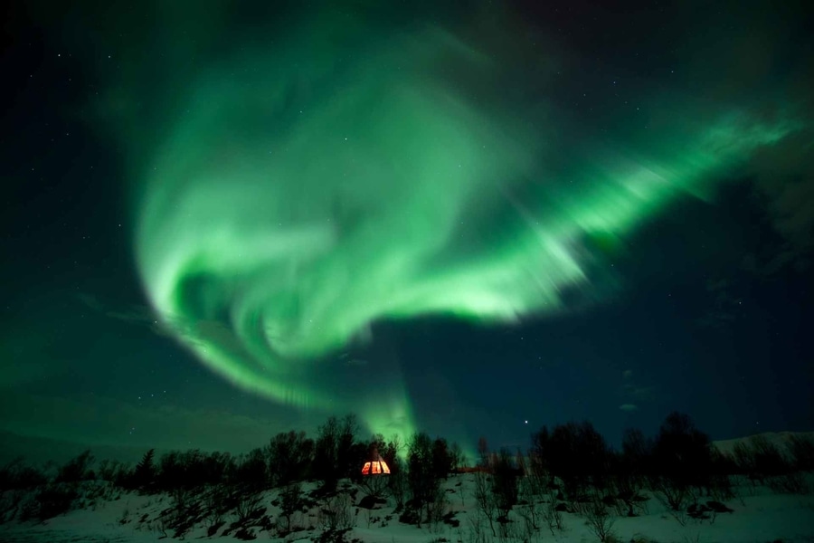 Seeing the Northern Lights, one of the best things to do in Tromso in winter because of the limited daylight