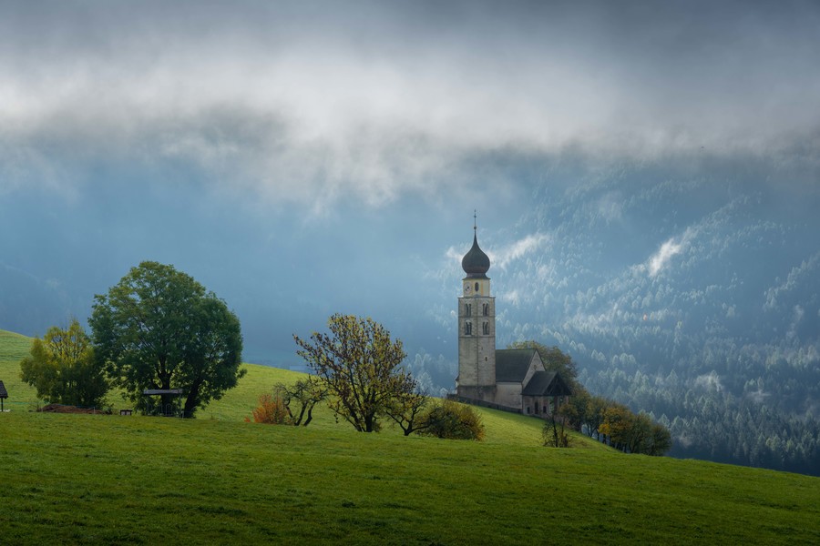 St. Valentin Chapel in Alpe di Siusi on an overcast fall day