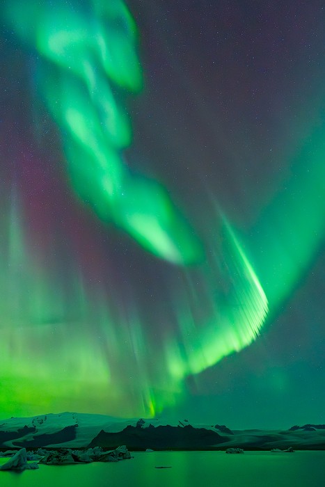 Northern lights over a glacier in Iceland