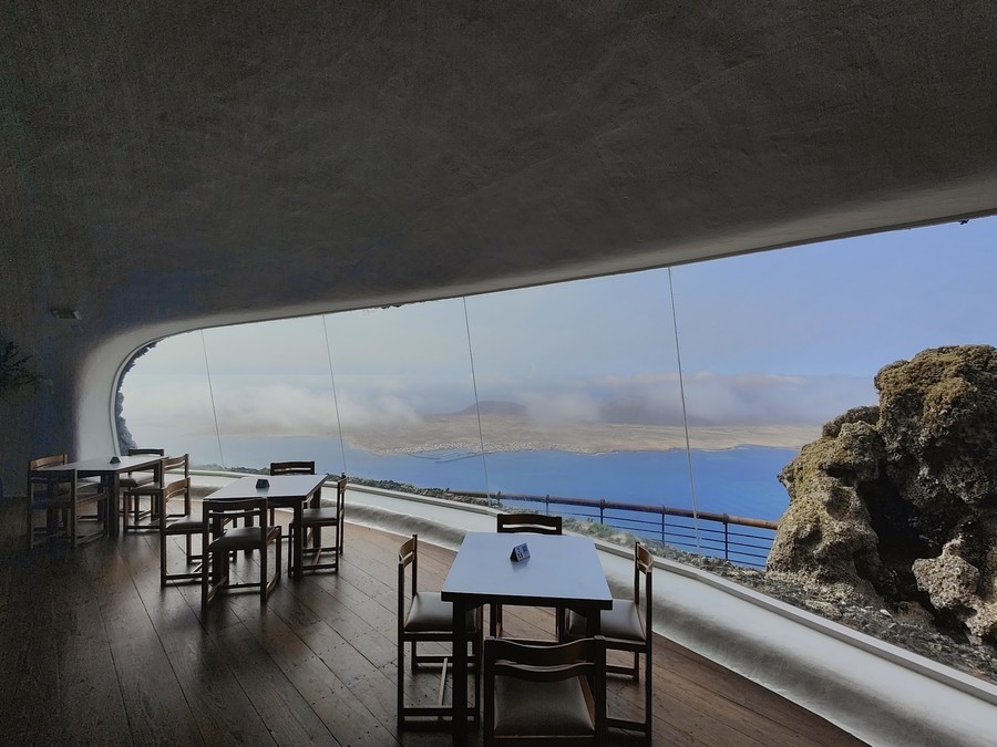Panoramic windows at the Mirador del Rio restaurant Windows overlooking the view at the Mirador del Rio cafe