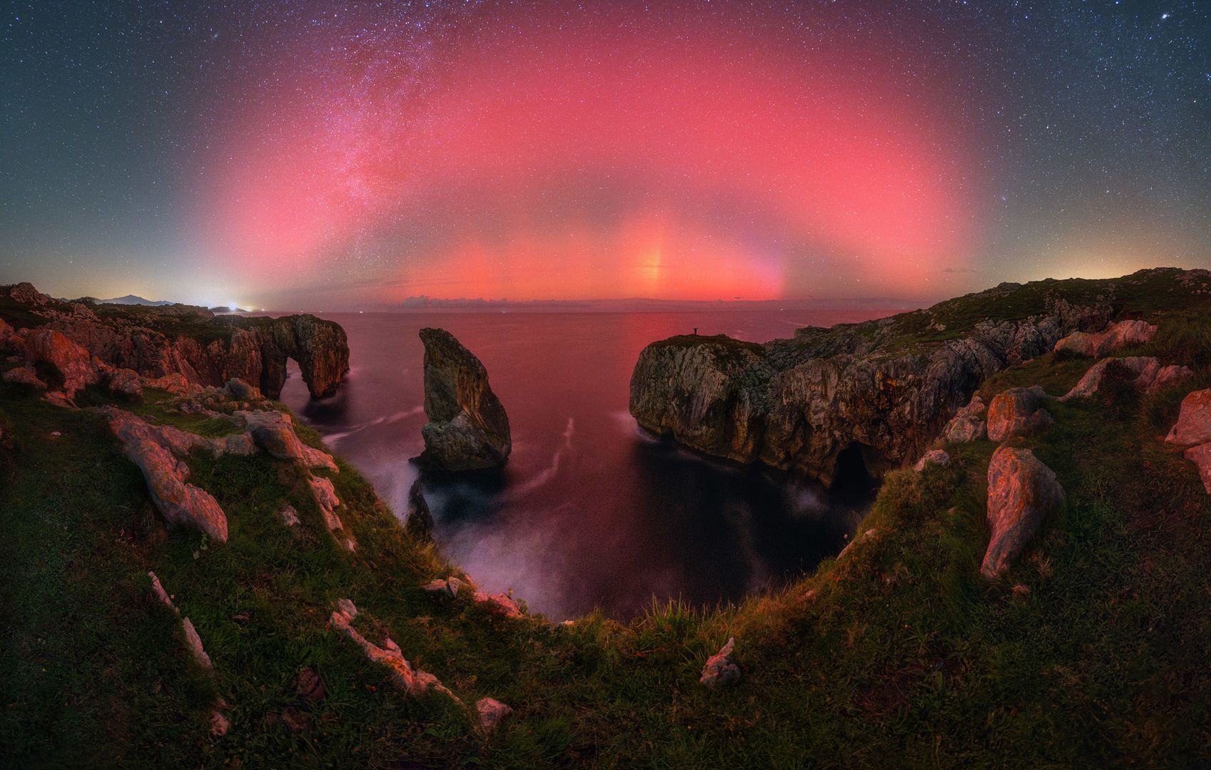 Aurora covering the sky over the northern coast of Spain Northern Lights panorama captured in Asturias, Spain