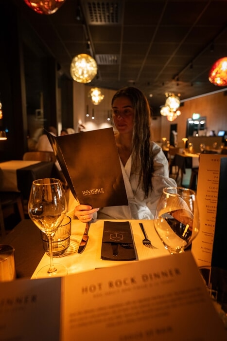 Dinning in bathrobe in Invisible Forest Lodge Dinner at Invisible Lodge Forest Rovaniemi